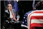  ?? [AP PHOTO] ?? Former Sen. Bob Dole pays his respects to former President George H.W. Bush.