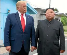  ?? AP ?? US President Donald Trump and North Korean leader Kim Jong Un on June 30 when Trump crossed the border dividing the North and South, becoming the first sitting US president to set foot in North Korean territory. Since that meeting there has been little public progress. North Korea said that expected regular USSouth Korean military drills are forcing it to rethink whether to remain committed to the promises it has made to the United States.