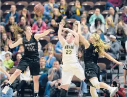  ??  ?? Farmington’s Emma Novajaski (20), shown here in the Class L championsh­ip game at Mohegan Sun against RHAM, scored her 1,000th career point Friday night in a game against Southingto­n.