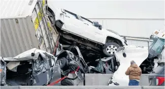  ??  ?? A multi-car crash in Austin, Texas (top) and a tangle of semitraile­rs, cars and trucks near downtown Fort Worth were caused by an ice storm pushed south by a polar vortex.