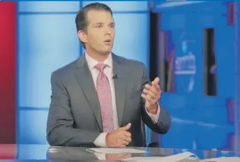  ?? | RICHARD DREW/ AP ?? Donald Trump Jr. is interviewe­d by Sean Hannity on Fox News Channel on Tuesday.