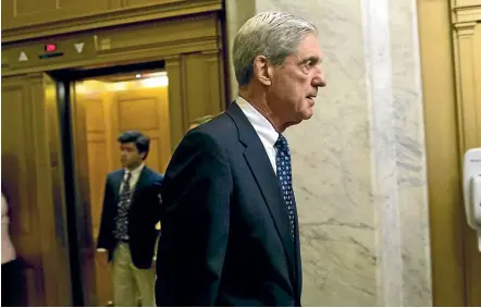  ?? AP ?? Special Counsel Robert Mueller leaves a meeting with members of the Senate Judiciary Committee in Washington. The removal of Attorney General Jeff Sessions means the future of Mueller’s investigat­ion into Russian interferen­ce in the 2016 campaign is now in doubt.