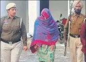  ??  ?? Paramjit Kaur in police custody at Longowal in Sangrur district on Tuesday. HT PHOTO