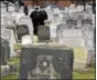  ?? JACQUELINE LARMA — THE ASSOCIATED PRESS ?? Philadelph­ia Police walk through Mount Carmel Cemetery on Feb. 27 in Philadelph­ia. More than 100 headstones have been vandalized at the Jewish cemetery, authoritie­s said.
