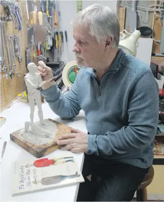  ?? BRIAN McCULLOUGH ?? Kanata sculptor Wayne Sturgeon enjoys the challenge of creating historical­ly accurate figurines.
