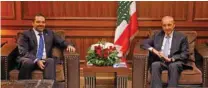  ?? - Reuters ?? OPTIMISTIC: Lebanese Parliament Speaker Nabih Berri sits with Prime Minister-designate Saad Al Hariri inside the parliament building at downtown Beirut, Lebanon May 28, 2018.