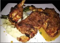  ?? Arkansas Democrat-Gazette/JENNIFER NIXON ?? Chicken stuffed with Boursin cheese is among the entrees at Brave New Restaurant.