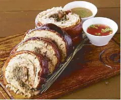  ??  ?? A mouthwater­ing porchetta from Livestock