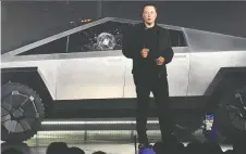  ?? ROBERT HANASHIRO-USA TODAY ?? Tesla CEO Elon Musk unveils the Cybertruck in Hawthorne, Calif. The cracked window glass occurred during a demonstrat­ion on the strength of the glass.