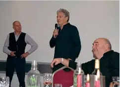  ??  ?? Bernie Schreiber holds court in the dinner speeches, Dave Austin listens as does compere Jack Burnicle.