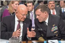  ?? JIM LO SCALZO, EUROPEAN PRESSPHOTO AGENCY ?? Intelligen­ce officials James Clapper, left, and Michael Rogers get ready to testify Thursday before the Armed Services Committee.