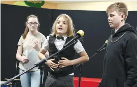  ??  ?? Left - St Paul’s students Zoe Lecher, Amon Calabro and Tarrant Cannon undertake filming for show one of St Paul’s movie musical masterpiec­e “Cindy”.
