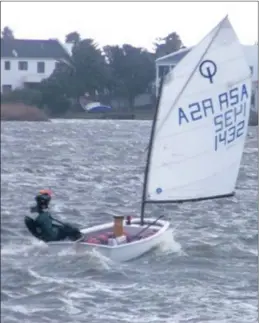  ??  ?? With school cancelled for the Wednesday due to a forecast 50-knot wind, Alex Falcon, 13, decided to go sailing.