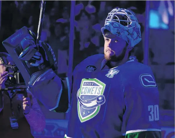  ?? — LINDSAY A. MOGLE/UTICA COMETS FILES ?? Thatcher Demko of the Utica Comets, one of the stars in his squad’s 5-2 victory over the Toronto Marlies in AHL playoff action Friday, salutes the crowd at the Adirondack Bank Center in Utica, N.Y.