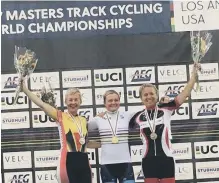  ??  ?? Lindsay Clarke (left) on the podium at the World Masters Championsh­ips in California.