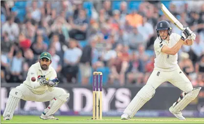  ??  ?? Jos Buttler cuts a ball watched by wicketkeep­er Sarfraz Ahmed at Headingley