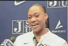 ?? MACKENZIE SALMON/MISSISSIPP­I CLARION LEDGER ?? Lady Tigers head coach Tomekia Reed says she has studied coach Schaefer. “When he takes the jacket off, the team goes to another level,” she said.