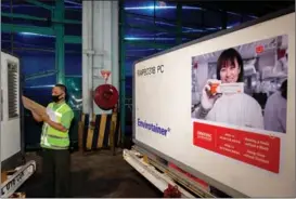  ?? PHOTOS BY DHEMAS REVIYANTO / ANTARA FOTO / REUTERS ?? A shipment of vaccine produced by Sinovac Biotech arrives at Soekarno-Hatta Internatio­nal Airport in Jakarta, Indonesia, on Dec 6.