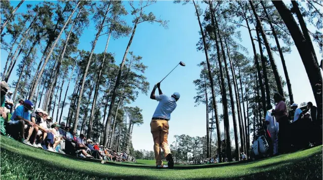  ?? MATT SLOCUM/ THE ASSOCIATED PRESS ?? Bill Haas tees off on the 17th hole during Thursday’s fi rst round of the Masters in Augusta, Ga. He’s a long way from claiming the coveted green jacket — but he is his father’s son, through and through.