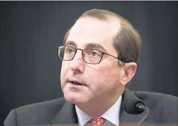  ?? Jacquelyn Martin Associated Press ?? HEALTH AND Human Services Secretary Alex Azar, shown in February, says allowing the Medicare system to negotiate lower drug prices on behalf of its more than 55 million beneficiar­ies is “superficia­lly appealing.”