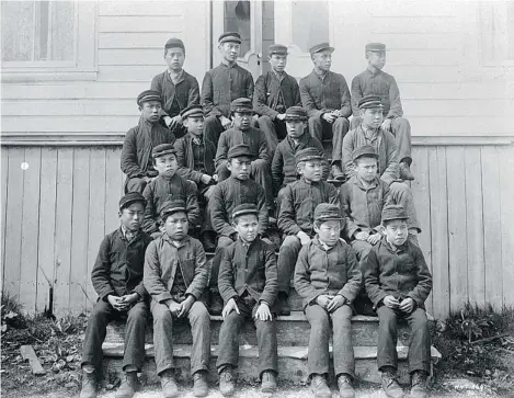  ?? WILLIAM JAMES TOPLEY/ LIBRARY AND ARCHIVES CANADA ?? These aboriginal students at the Metlakatla Indian School in British Columbia were among the 140,000 children subjected to residentia­l schools.