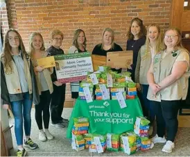  ?? PHOTO SUBMITTED ?? Pictured: (l-r): Allison Allmon and Grace Lengerich, Girl Scout Troop 00415, Nancee Linn, ACCF Staff, Rachel Fravel, St. Joe Teacher; Janel Lengerich, Troop 00415 Leader; Amy Smith, St. Joe Teacher; Janessa Lengerich and Sara Robinson, Girl Scout Troop 0041