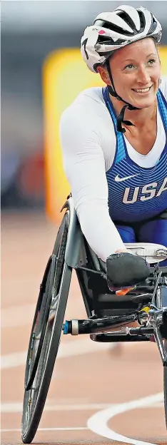  ??  ?? Unbeatable: Tatyana Mcfadden takes her latest gold three months after a serious health scare