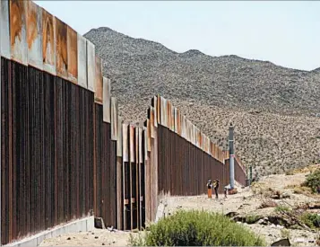  ?? HERIKA MARTINEZ/GETTY-AFP ?? At the current pace, it would take over 15 years to build a wall along the 1,300 miles of the border now without barriers.