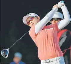  ??  ?? Eun-Hee Ji of Korea tees off the 18th hole en route to a -16 under par victory during the Final Round of the LPGA KIA Classic at the Park Hyatt Aviara golf course in Carlsbad, California. — AFP photo