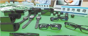  ?? Yonhap ?? Various small cameras are displayed at a customs office in Incheon last month. Calls are growing for a law revision against an increasing number of crimes involving hidden cameras.