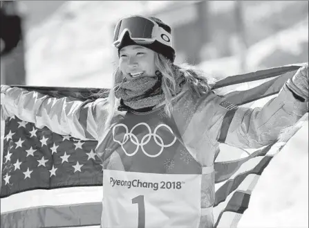  ?? Gregory Bull Associated Press ?? CHLOE KIM, 17, was an accomplish­ed snowboarde­r with deals with Visa, Nike and others even before winning halfpipe gold, above.