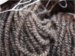  ??  ?? Stuff It
Hästens’s longtime suppliers weave, color, and coil the horsetail hair to precise specificat­ions. Once received, the ropes are separated into different lengths and microcurls before being teased and fluffed.