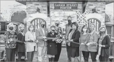  ?? Catoosa County Public Schools ?? School officials cut the ribbon at the new Ben Carson Reading Room at Woodstatio­n Elementary School.