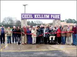  ??  ?? Dedication: City leaders and community members turned out for the ribbon cutting of Cecil Kellum Park behind the Boys and Girls Club. The park is named after Cecil Kellum, who started the athletic program at the club.