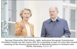  ?? Picture: AP ?? German Chancellor Olaf Scholz, right, welcomes European Commission President Ursula von der Leyen, left, for a meeting as part of a two-day closed meeting of the German government at Meseberg palace in Gransee near Berlin, Germany.