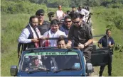  ?? — PTI ?? Assam chief minister Sarbananda Sonowal along with other leaders during a jeep safari in the Kaziranga National Park in Nogaon on Saturday. The park reopened for tourists after the monsoon season.