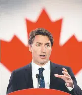  ?? - La Presse Canadienne: Adrian Wyld ?? Justin Trudeau a promis de renoncer à l’achat des chasseurs F15 pour les remplacer par des avions moins coûteux.