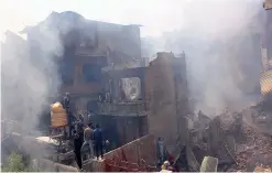  ?? — H.U. Naqash ?? Several houses were destroyed in Dana Mazaar locality of Srinagar’s Nawa Kadal area on Tuesday due to encounter.