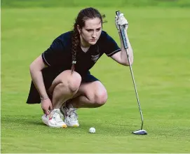  ?? Tyler Sizemore/Hearst Connecticu­t Media ?? Trumbull’s Grace Codd lines up a putt during a match against Greenwich at Griffith E. Harris Golf Course in Greenwich on April 29.