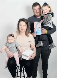  ?? PHOTO: LINDA ROBERTSON ?? Always with them . . . The family of Rylan Peterson (2), who died from a brain tumour last year, Ruby Stringer (6 months), Chevonne Marsh and Callum and Meyah Stringer (2). Miss Marsh holds Rylan’s ashes.