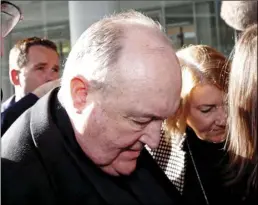  ?? DARREN PATEMAN/AAP IMAGE VIA AP ?? Australian Archbishop Philip Wilson arrives for sentencing at Newcastle Local Court in Newcastle, July 3. Wilson, the most senior Roman Catholic cleric in the world to be convicted of covering up child sex abuse, was sentenced to 12 months in detention.