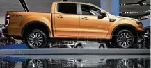  ?? Andrew Harrer / Bloomberg ?? The 2019 Ford Motor Co. Ranger midsize pickup truck is displayed this week at an auto show in Detroit.