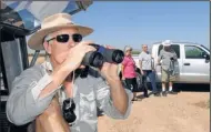  ??  ?? Bill Mader of Las Cruces, whose brother’s science experiment was aboard a space shuttle flight, came out to watch Endeavour’s farewell tour.