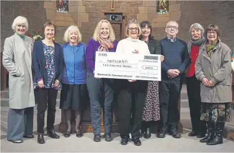  ?? ?? Members of Blackhall St Columba’s present a cheque for £10,000 to HopScotch in their latest annual charity donation