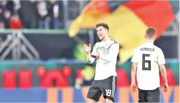  ?? - AFP photo ?? Germany’s midfielder Leon Goretzka (L) celebrates scoring with Germany’s midfielder Joshua Kimmich during the friendly football match Germany v Serbia.