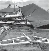  ??  ?? Damaged building at the Parliament House in Tonga's capital of Nuku'alofa after Cyclone Gita hit the country.