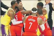  ?? Marcio Jose Sanchez Associated Press ?? CHRIS PAUL fights with Rajon Rondo, whom the Houston point guard accused of spitting on him.