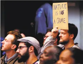  ?? Santiago Mejia / The Chronicle 2019 ?? Oakland resident Steve Hull listens in during a public safety committee hearing at Oakland City Hall in 2019 as City Council members hear a resolution on decriminal­izing plantbased psychedeli­cs.