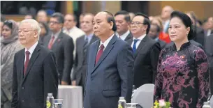  ?? AFP ?? Vietnam’s Communist Party General Secretary Nguyen Phu Trong, left, Prime Minister Nguyen Xuan Phuc and National Assembly chairwoman Nguyen Thi Kim Ngan at the 37th Asean Summit.