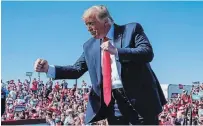  ?? ALEX BRANDON THE ASSOCIATED PRESS ?? President Donald Trump dances at a campaign rally on Monday in Prescott, Ariz. He urged his supporters to work as hard as possible during the race’s final stretch.
